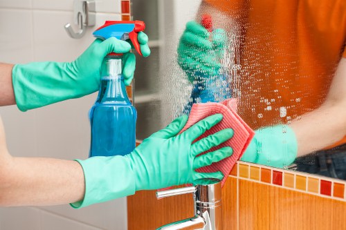 Carpet cleaning team preparing equipment safely in Streatham